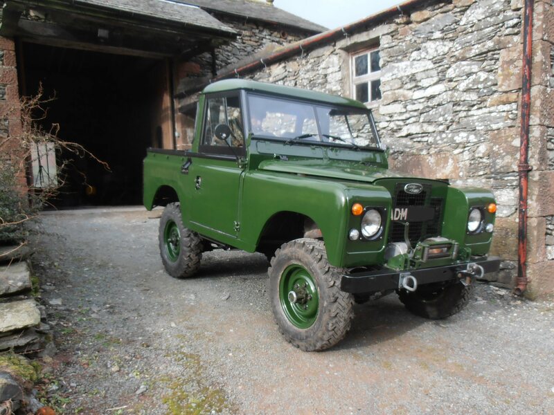 Green Land Rover Series 2a driver side view.